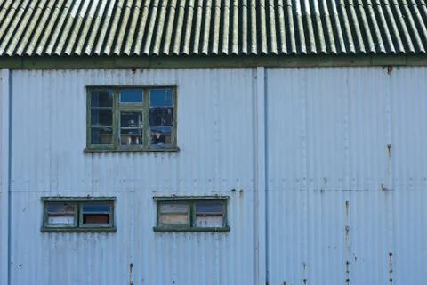 The Old Blue Boathouse By The Docks Stock Photos
