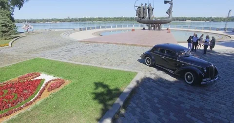 Old blue limousine rides Stock Footage 90288965