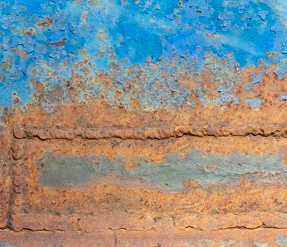 Old blue metal case with rust in the welds. Stock Photos