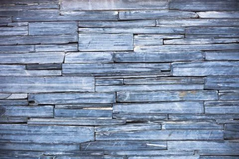 Old blue modern pattern of stone wall decorative surfaces Stock Photos