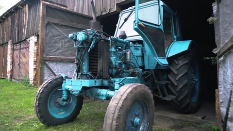 Old blue retro tractor engine Video stock 343612857