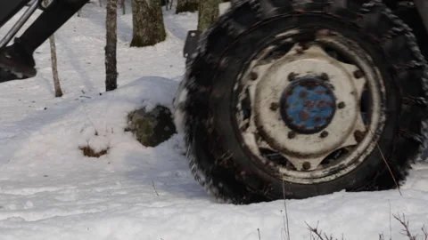 Old, blue tractor driving Stock Footage 143485332