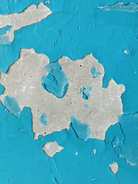 Old blue wall with peeling paint. Renovation of old premises. Background with Stock Photos
