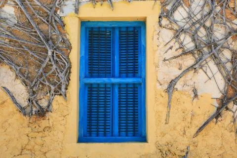 Old blue window Fotos de archivo