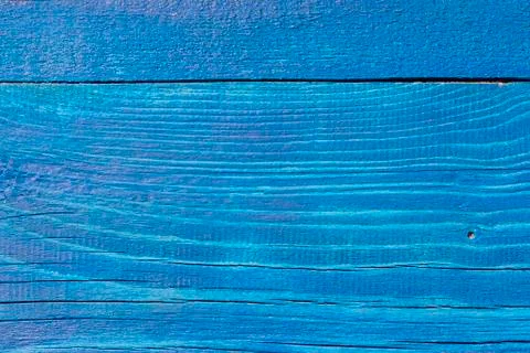 Old blue wooden background with cracks and stripes.Wooden wall painted in blu Foto stock