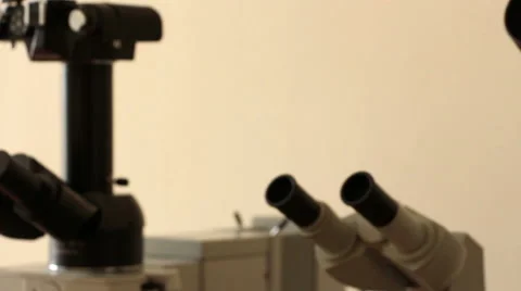 Old blurred microscopes diagonal panning Stock Footage 61136747