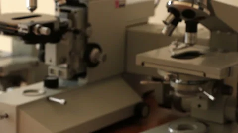 Old blurred microscopes panning Stock Footage 61136768