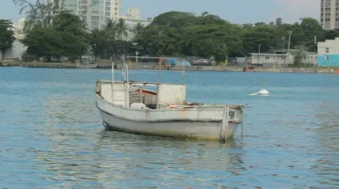 Old boat in bay Stock Footage 12422703