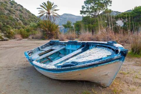 Old boat on a beach Stock Photos