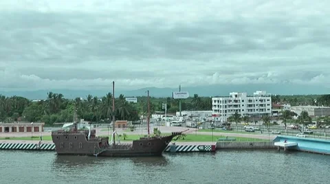 Old boat in front of the highway, Puerto Vallarta Stock Footage