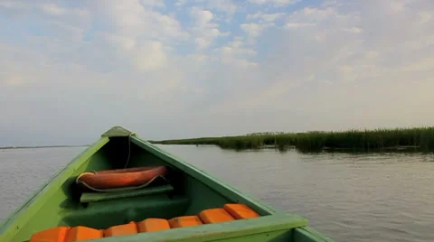 Old boat on the river Stock Footage 8763748