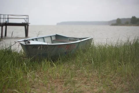 Old boat on the river Stock Photos