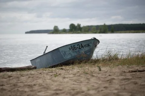 Old boat on the river Stock Photos