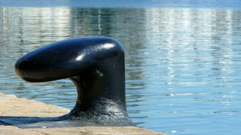 Old bollard on the seaport of Barcelona. Stock Footage