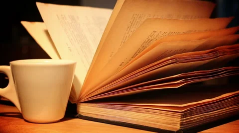Old book and cup Stock-Footage 46058795