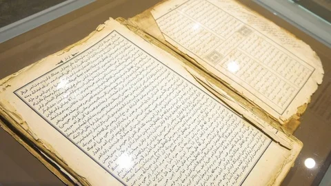 An old book in Arabic in the museum Stock Footage 119480176