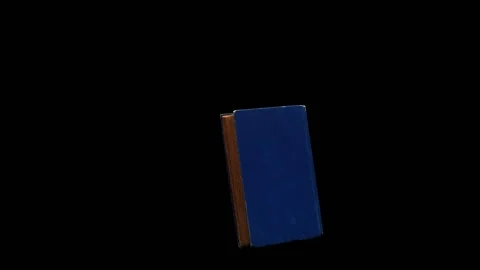 An old book with a blue binding and a brown edge rotates in different directions Stock Footage 155664723
