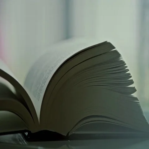 Old book close-up, Red Epic slow motion clip Stock Footage