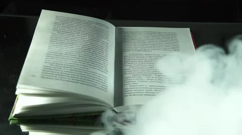 Old book in the mist on the black background Video stock 55369497