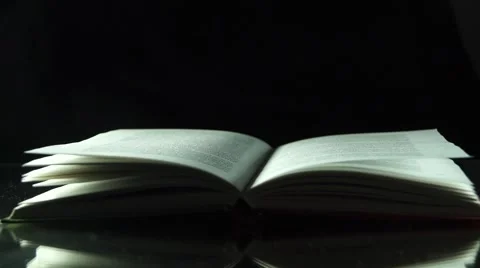Old book in the mist on the black background Stock Footage 55369520