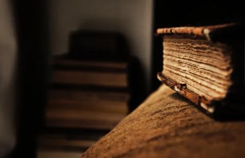 Old Book on a Velvet Sofa Stock Photos