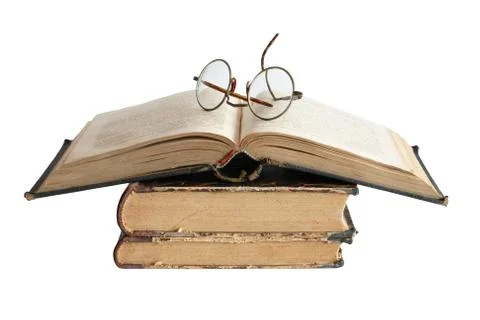 Old books and spectacles Stock Photos
