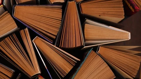 Old books background. Hardback books. Top view. Stock Footage 268873891