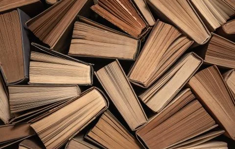 Old books background, high angle view of many old books with copy space Stock Photos