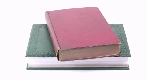 Old books rotating on white background Stock Footage 36149550