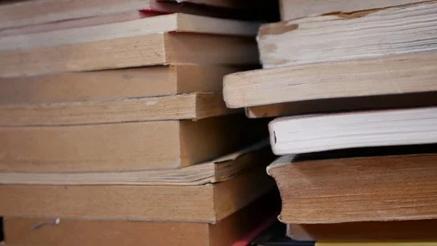Old books in rows, shallow depth of field, Stock Footage 107639492