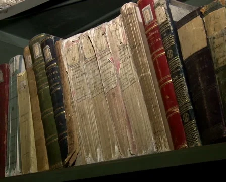 Old books on the shelf Stock Footage 55622450