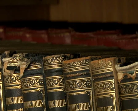 Old books on the shelf Stock Footage 55622575