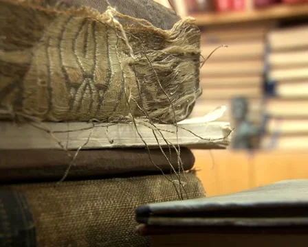 Old books on the table Stock Footage 55622960