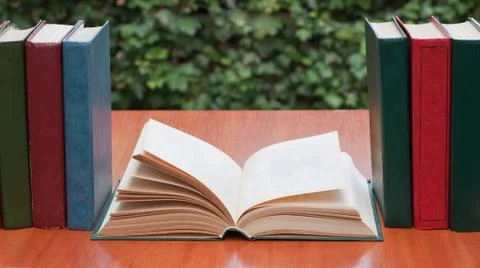 Old books on the table Stock Photos