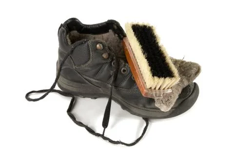 Old boot with  shoe brush Stock Photos