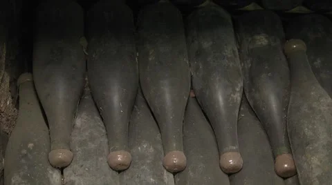 Old bottle of wine in a cellar Stock Footage 58485493