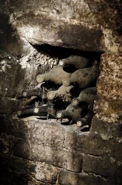 Old bottles in a cellar Stock Photos