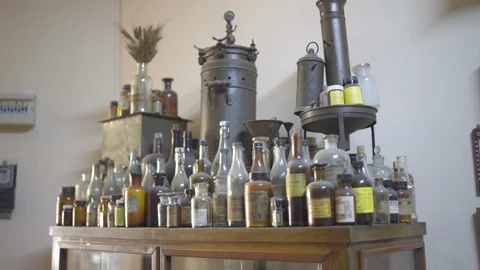 Old bottles in a pharmacy store. Stock Footage 124651652