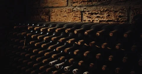 Old bottles of red wine in a cellar. red epic . 4k 스톡 동영상 88040978