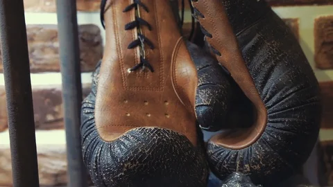 Old boxing gloves close-up. motion shot Stock Footage 86701341