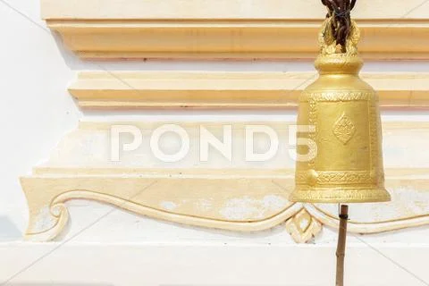 Old brass buddhist bell in temple. Stock Photos