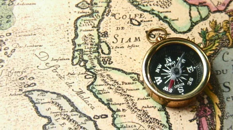 Old brass compass over antique map Video stock 711915