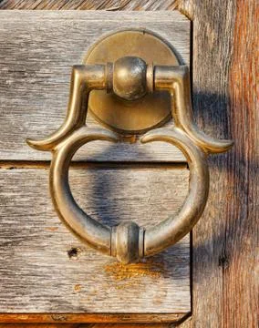 Old brass door handle Stock Photos