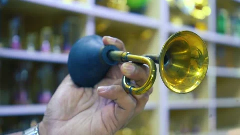 Old Brass Horn in hand 4k footage Stock Footage 316968529