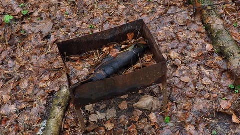 Old brazier in the forest. Uncleaned garbage, environmental problems. Stock Footage 120258172