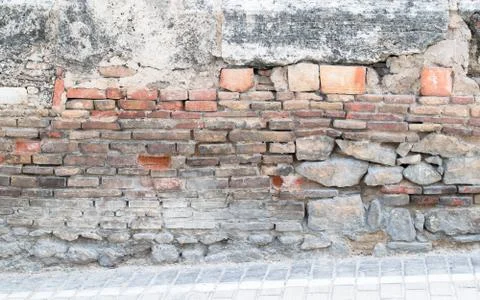 Old brick and stone wall. Stock Photos