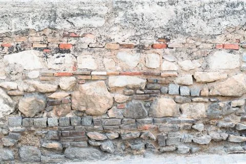 Old brick and stone wall. Stock Photos