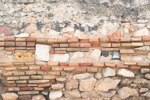 Old brick and stone wall. Stock Photos