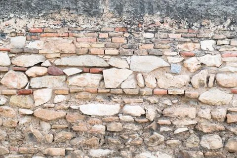 Old brick and stone wall. Stock Photos