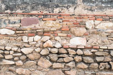 Old brick and stone wall. Stock Photos